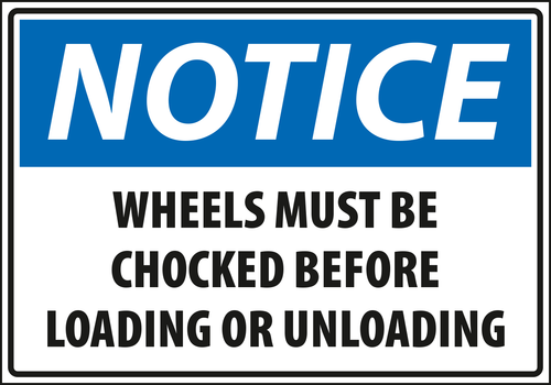 Notice - wheels must be chocked before loading or unloading.
