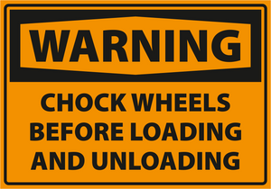 Warning - Caution chock wheels before loading and unloading