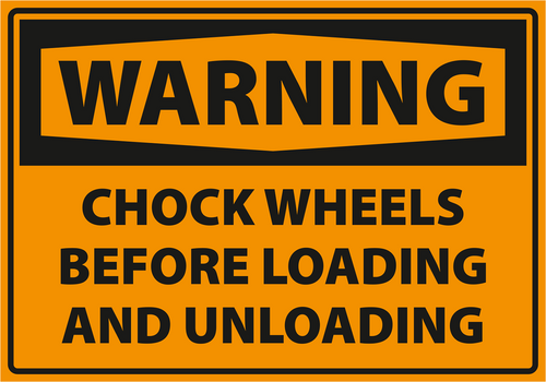 Warning - Caution chock wheels before loading and unloading